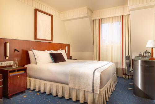 Habitación Doble Signature con cama extragrande del hotel Des Grands Voyageurs