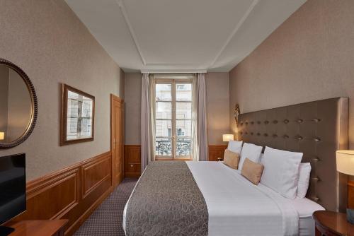 Suite Junior del hotel Melia Paris Vendôme. Foto 3