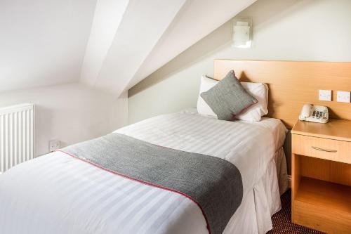 Habitación Doble Estándar - 2 camas del hotel OYO London Guest House. Foto 6