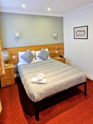 Habitación Doble Estándar del hotel OYO London Guest House. Foto 4