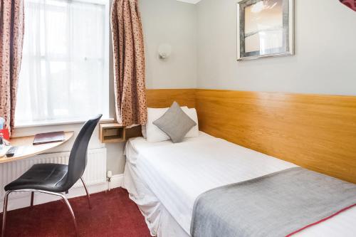 Habitación Individual Estándar del hotel OYO London Guest House. Foto 4