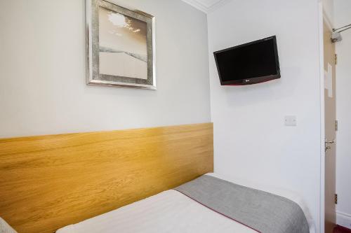 Habitación Individual Estándar del hotel OYO London Guest House. Foto 5