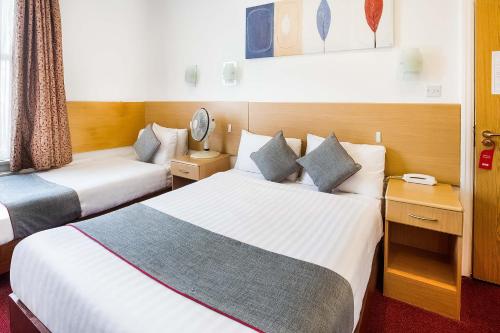 Habitación Cuádruple Deluxe del hotel OYO London Guest House