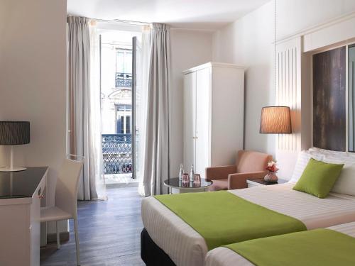 Habitación Doble - 2 camas del hotel Paris Opera Affiliated by Meliá. Foto 9