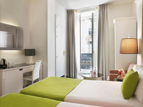 Habitación Doble - 2 camas del hotel Paris Opera Affiliated by Meliá. Foto 10