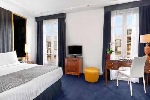 Habitación Doble Premium - 2 camas del hotel Melia Paris Champs Elysées. Foto 1