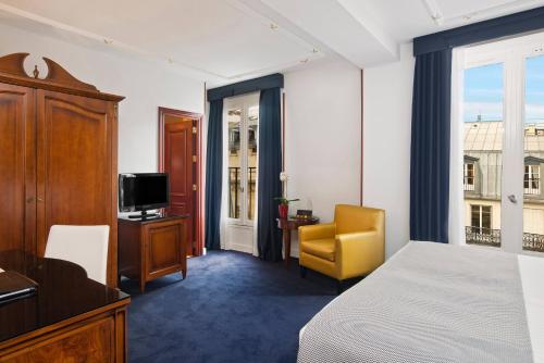 Habitación Doble Meliá del hotel Melia Paris Champs Elysées. Foto 1