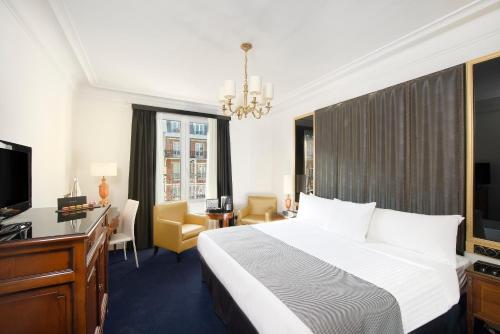 Habitación Gran Premium del hotel Melia Paris Champs Elysées. Foto 1