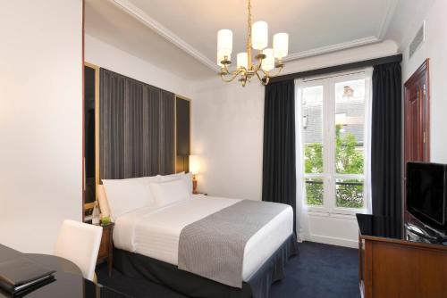 Habitación doble Melia del hotel Melia Paris Champs Elysées. Foto 7