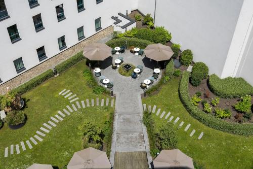 Habitación Doble Estándar con vistas al jardín del hotel One Brussels. Foto 3