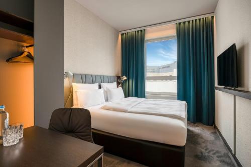 Habitación Doble Estándar del hotel One Brussels. Foto 1