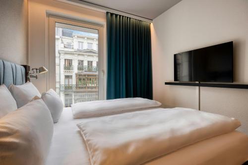Habitación Doble Estándar del hotel One Brussels. Foto 3
