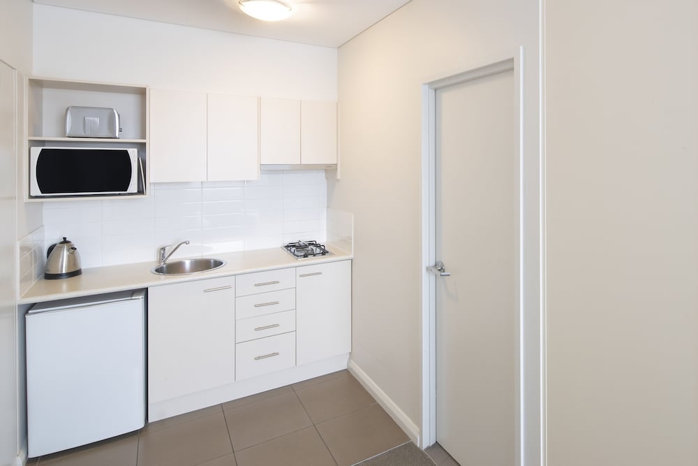 Apartamento con 1 cama queen size del hotel Mantra Castle Hill Sydney. Foto 5