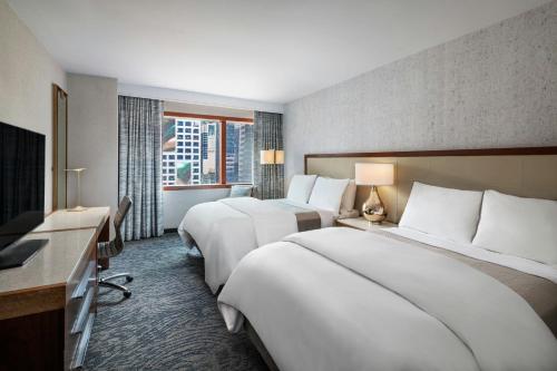 Habitación Doble Tradicional con aparcamiento incluido - 2 camas dobles - Planta inferior del hotel The Westin New York At Times Square. Foto 1