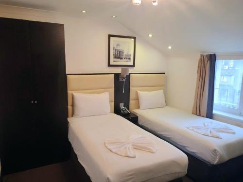 Habitación Doble - 2 camas del hotel Edward Paddington. Foto 9