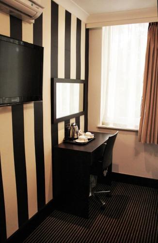 Habitación Triple del hotel Edward Paddington. Foto 1
