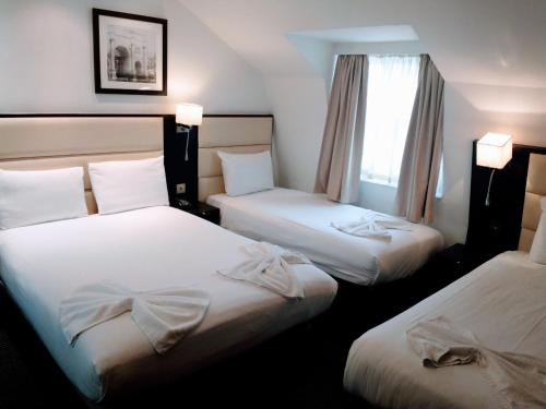 Habitación cuádruple del hotel Edward Paddington. Foto 4