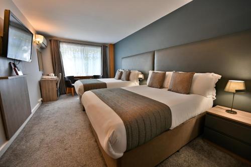 Habitación cuádruple del hotel Kensington Court