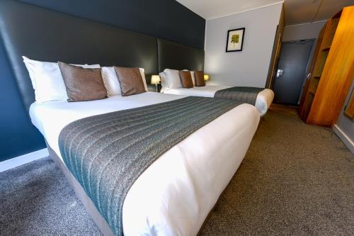 Habitación cuádruple del hotel Kensington Court. Foto 1