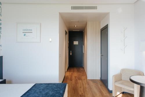 Habitación Doble con vistas al mar del hotel Neptuno. Foto 7