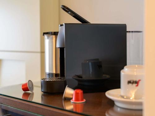 Suite Deluxe con cama extragrande del hotel Pullman Cologne. Foto 6