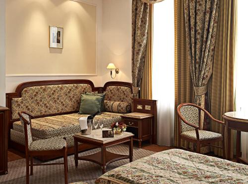 Habitación Triple Básica del hotel Ambassador Zlatá Husa. Foto 3
