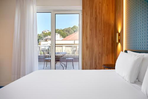 Habitación Doble con Terraza del hotel Exe Mitre. Foto 1