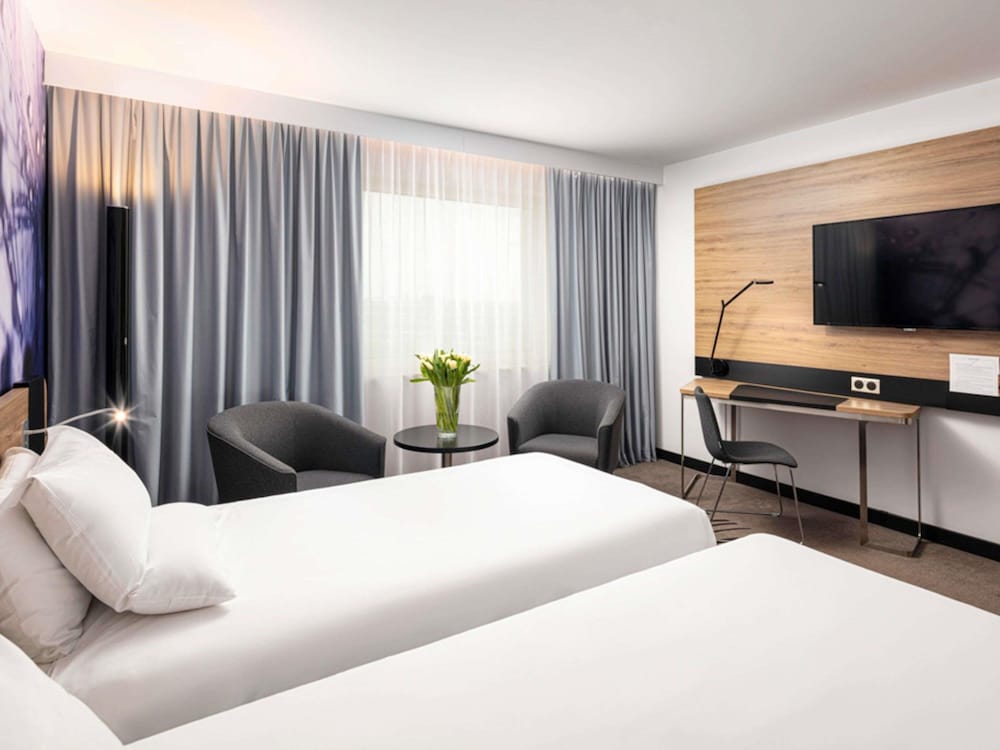 Habitación Executive con 2 camas individuales del hotel Novotel Poznan Centrum. Foto 3