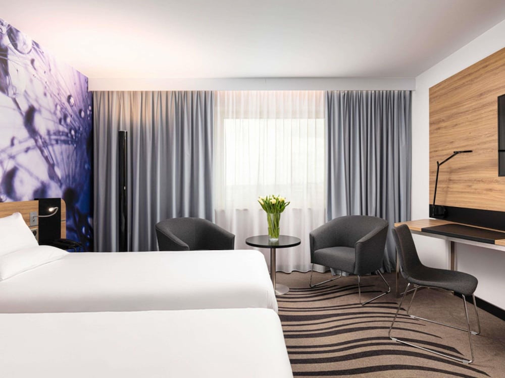 Habitación superior con 2 camas individuales del hotel Novotel Poznan Centrum. Foto 6