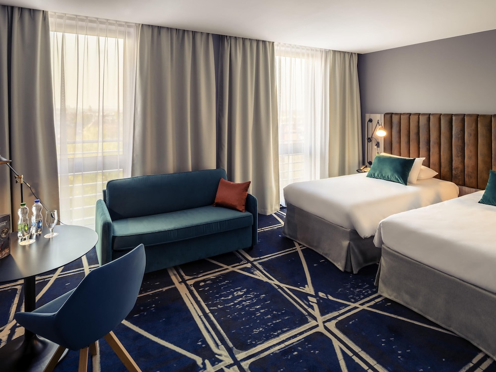 Habitación Privilege con dos camas individuales del hotel Mercure Poznan Centrum
