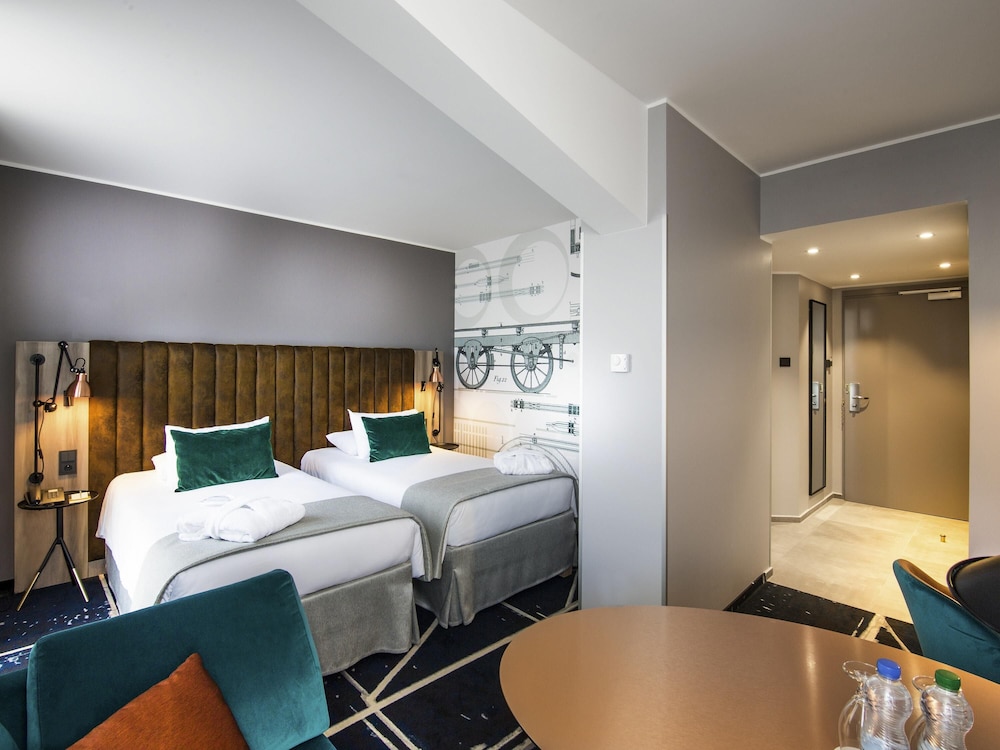 Habitación Privilege con dos camas individuales del hotel Mercure Poznan Centrum. Foto 1