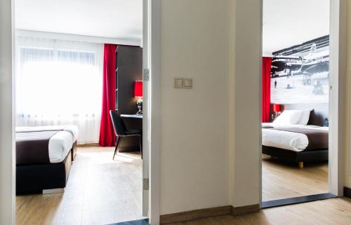 Habitación Cuádruple del hotel Best Western Plus Amsterdam Airport. Foto 7