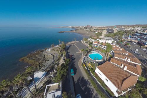 Apartamento de 1 dormitorio con balcón o terraza del hotel Sunsuites Carolina and Collection