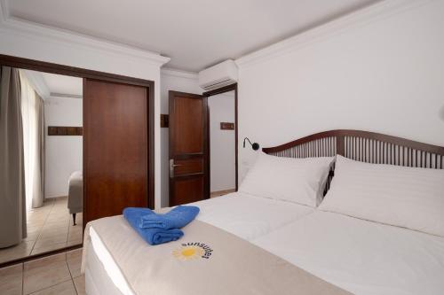 Apartamento de 1 dormitorio con balcón o terraza del hotel Sunsuites Carolina and Collection. Foto 6