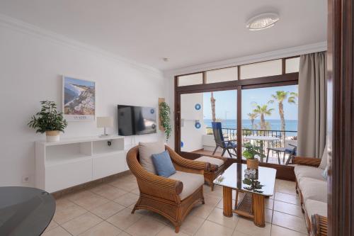 Apartamento de 1 dormitorio con balcón o terraza del hotel Sunsuites Carolina and Collection. Foto 8