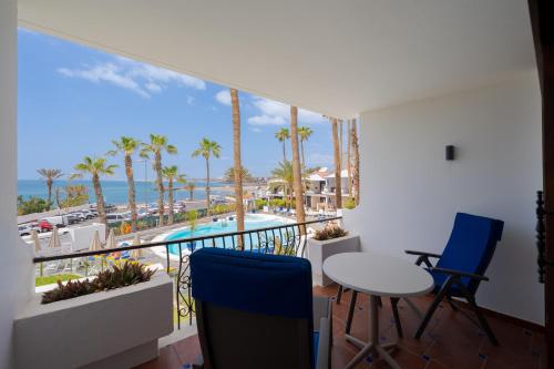 Apartamento de 1 dormitorio con balcón o terraza del hotel Sunsuites Carolina and Collection. Foto 11