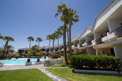 Apartamento de 1 dormitorio con balcón o terraza del hotel Sunsuites Carolina and Collection. Foto 3