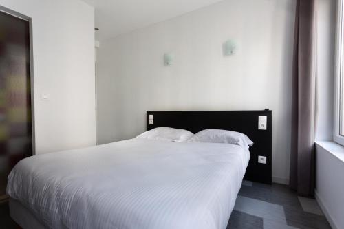 Habitación Doble Estándar del hotel Hôtel Mimosa. Foto 12