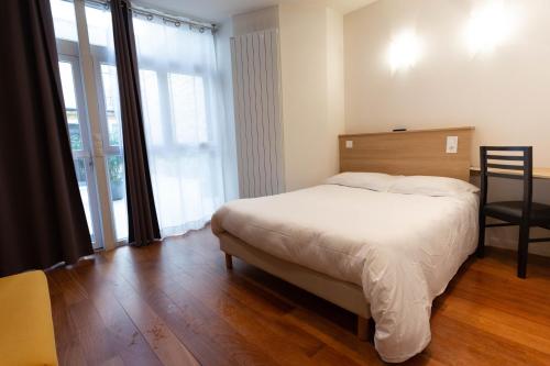 Habitación Doble Confort del hotel Hôtel Mimosa. Foto 15