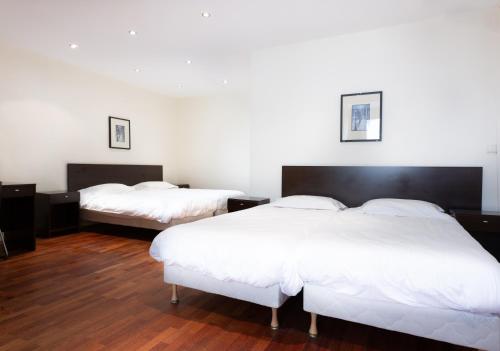 Habitación Cuádruple Estándar del hotel Hôtel Mimosa. Foto 3