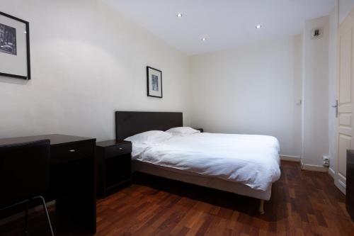 Habitación Cuádruple Estándar del hotel Hôtel Mimosa. Foto 7