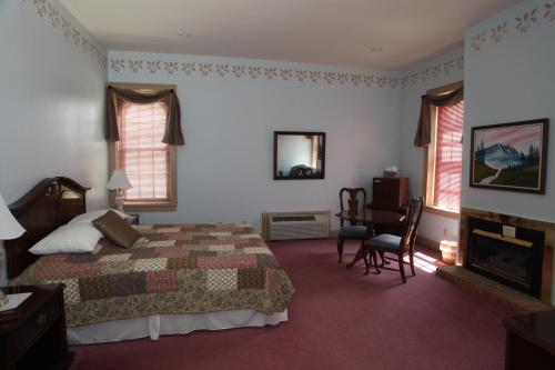 Suite Doble Deluxe - Cama grande del hotel Oak Valley Inn And Suites