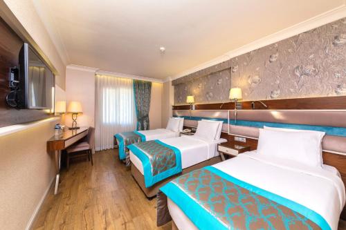 Habitación Triple Superior del hotel Grand Yavuz. Foto 5