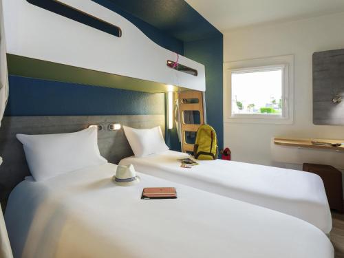 Habitación Doble con litera del hotel Ibis Budget Berck Sur Mer. Foto 1