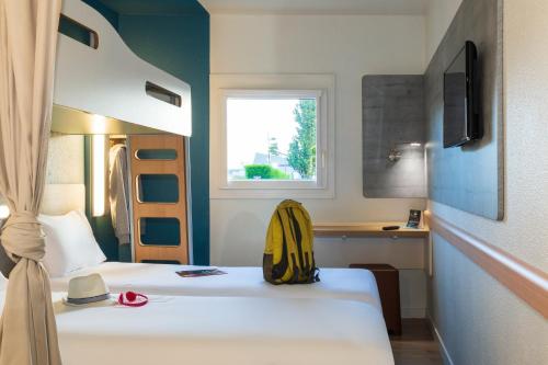 Habitación Doble con litera del hotel Ibis Budget Berck Sur Mer. Foto 3