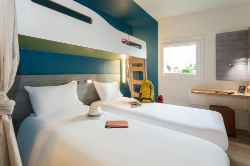 Habitación Doble con litera del hotel Ibis Budget Berck Sur Mer. Foto 4