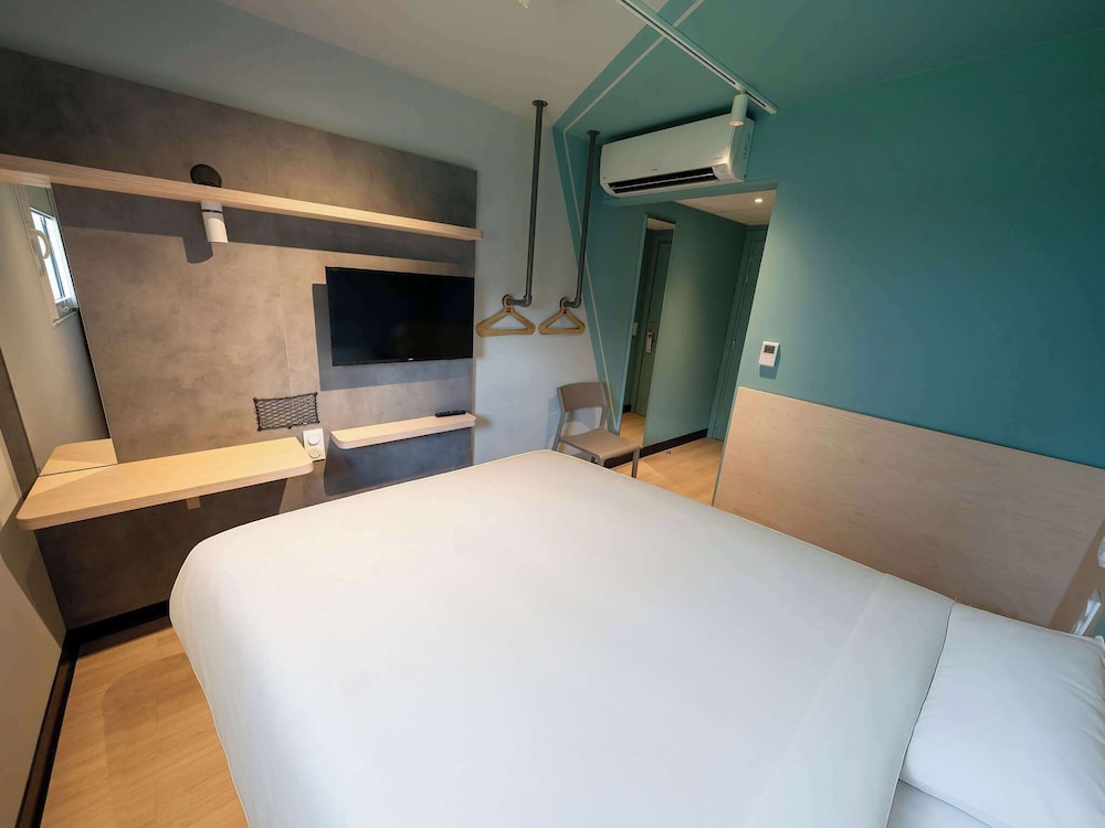 Habitación Clásica accesible para personas con movilidad reducida del hotel Ibis Budget Saint Etienne Stadium. Foto 2
