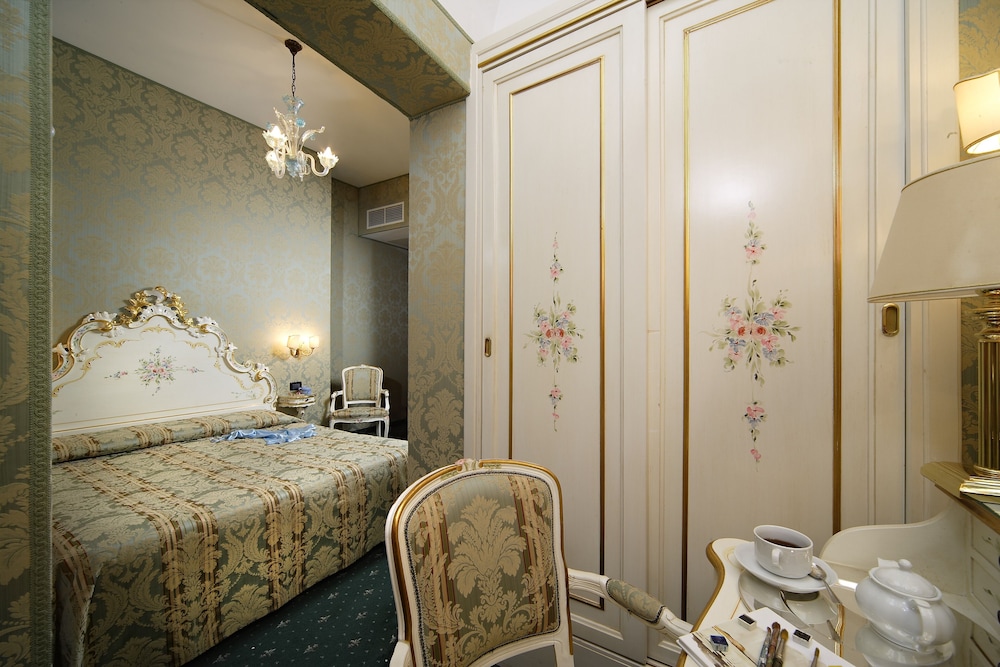 Habitación Triple del hotel Gorizia A La Valigia. Foto 6