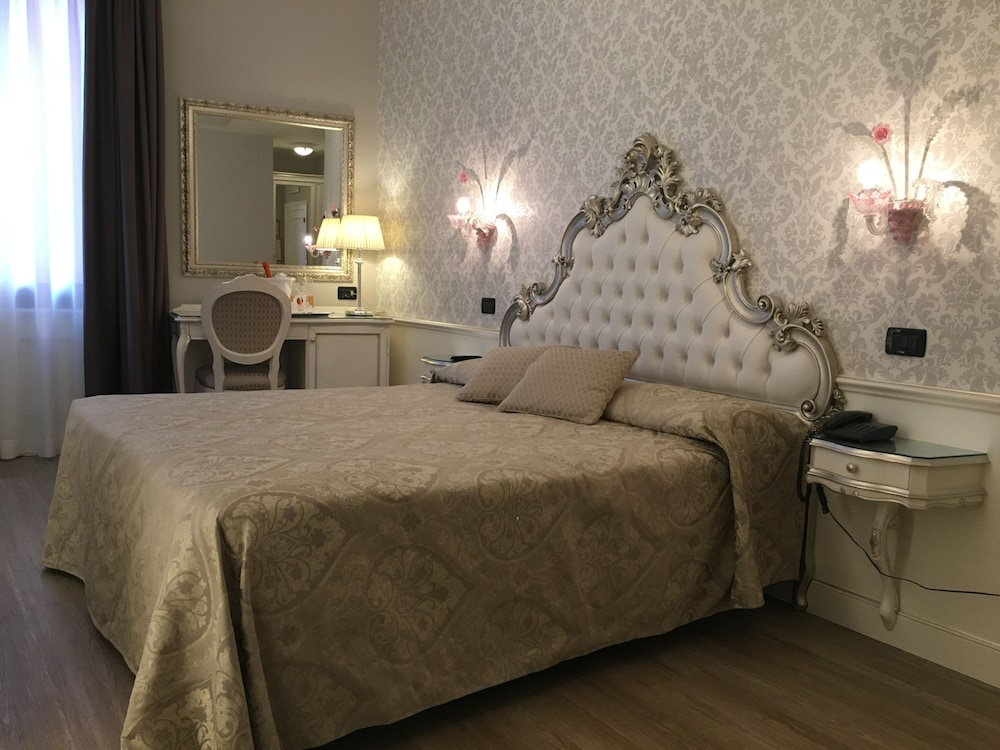 Habitación Triple del hotel Gorizia A La Valigia. Foto 7