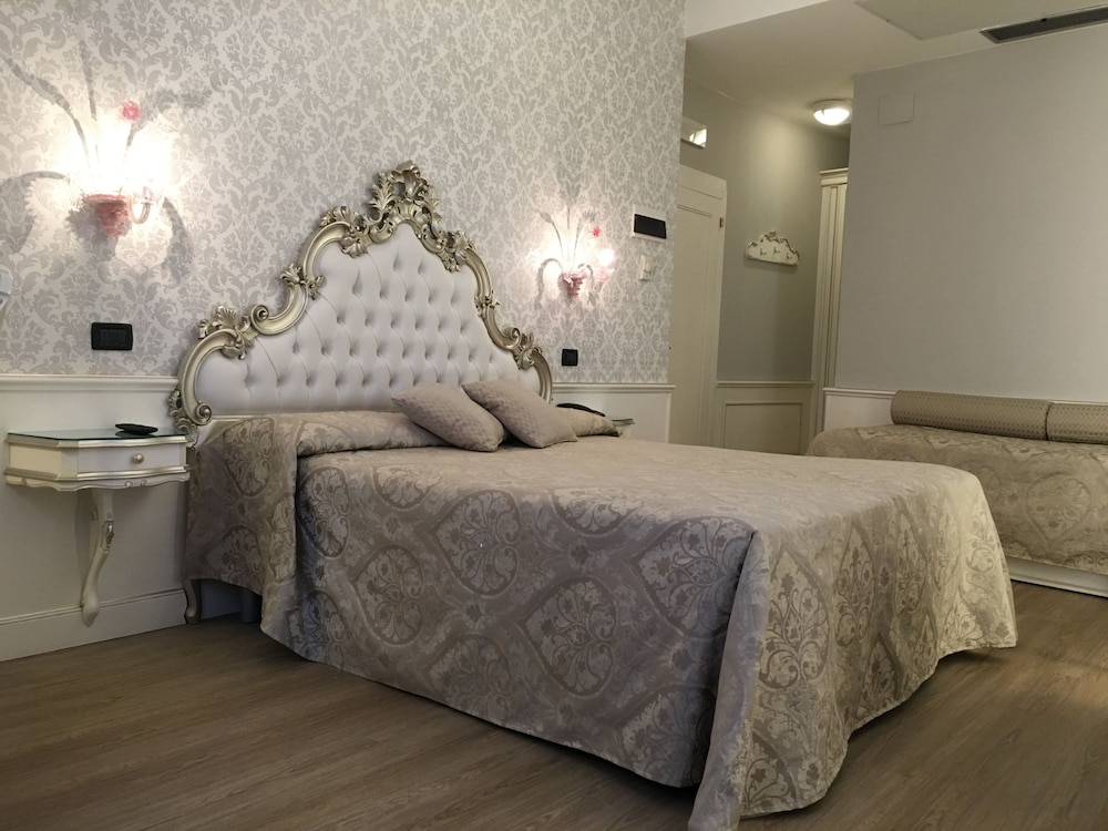 Habitación Triple del hotel Gorizia A La Valigia. Foto 10